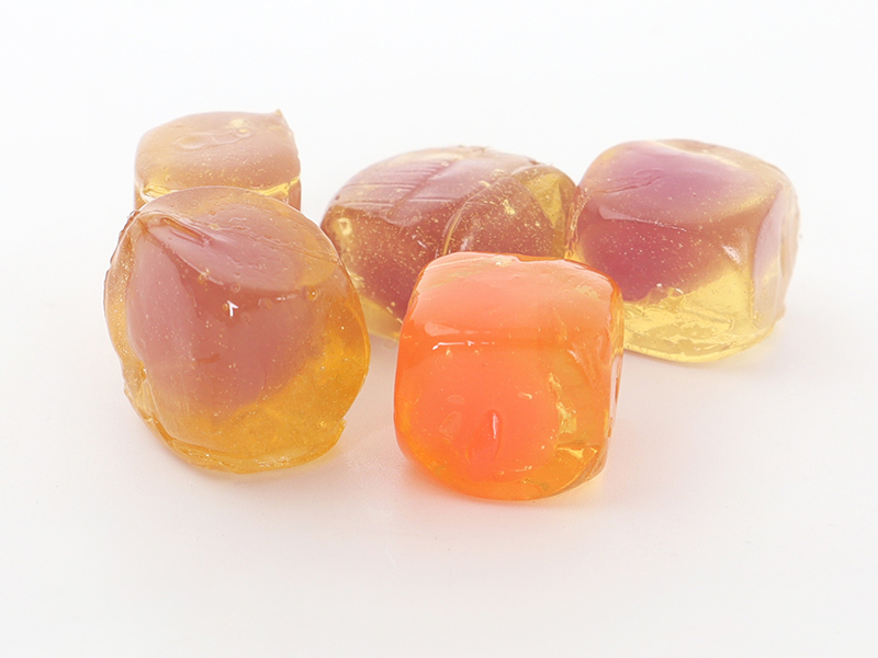 Blind box gummy candy showing layered peel-and-reveal confectionery concept