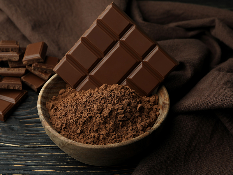 Dark chocolate with a cup of coffee, a perfect pairing for focus and energy.