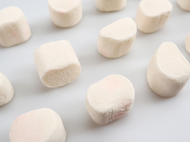 Shaped marshmallow candy produced by extrusion process with consistent size and soft texture