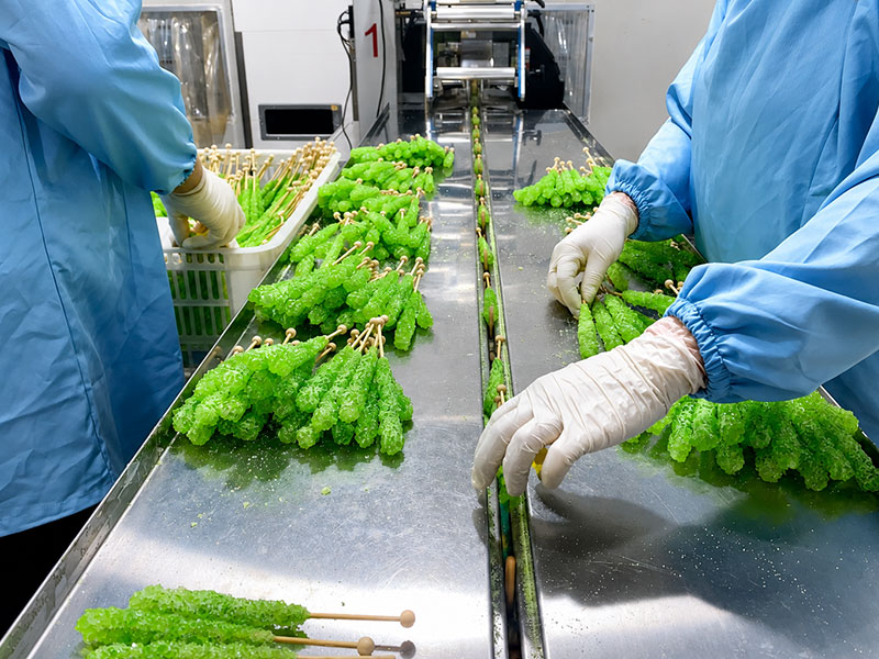Rock candy production process in a professional candy manufacturing factory